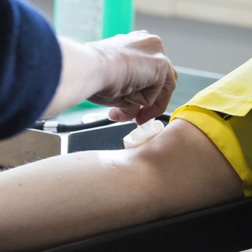Nurse taking blood