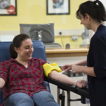 Nurse taking blood
